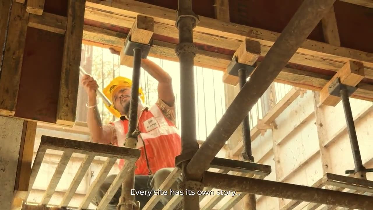 A site engineer setting cup lock props on an Elimoc Infra project.